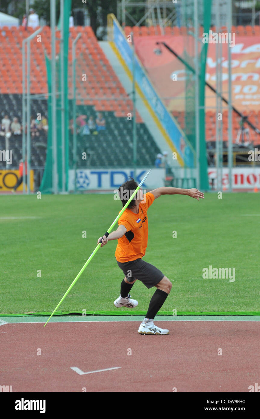 Athlete takes part in javelin throw during the 2013 IAAF World Junior