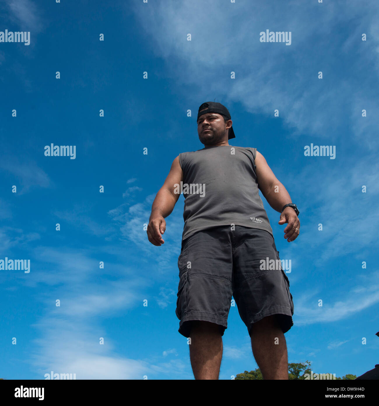 Low angle view of a man standing Utila Island Bay Islands Honduras Stock Photo