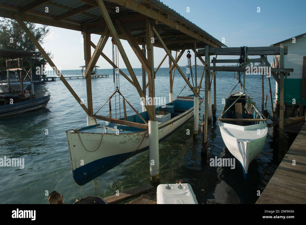 Boats at a dock Cayman Cay Utila Island Bay Islands Honduras Stock