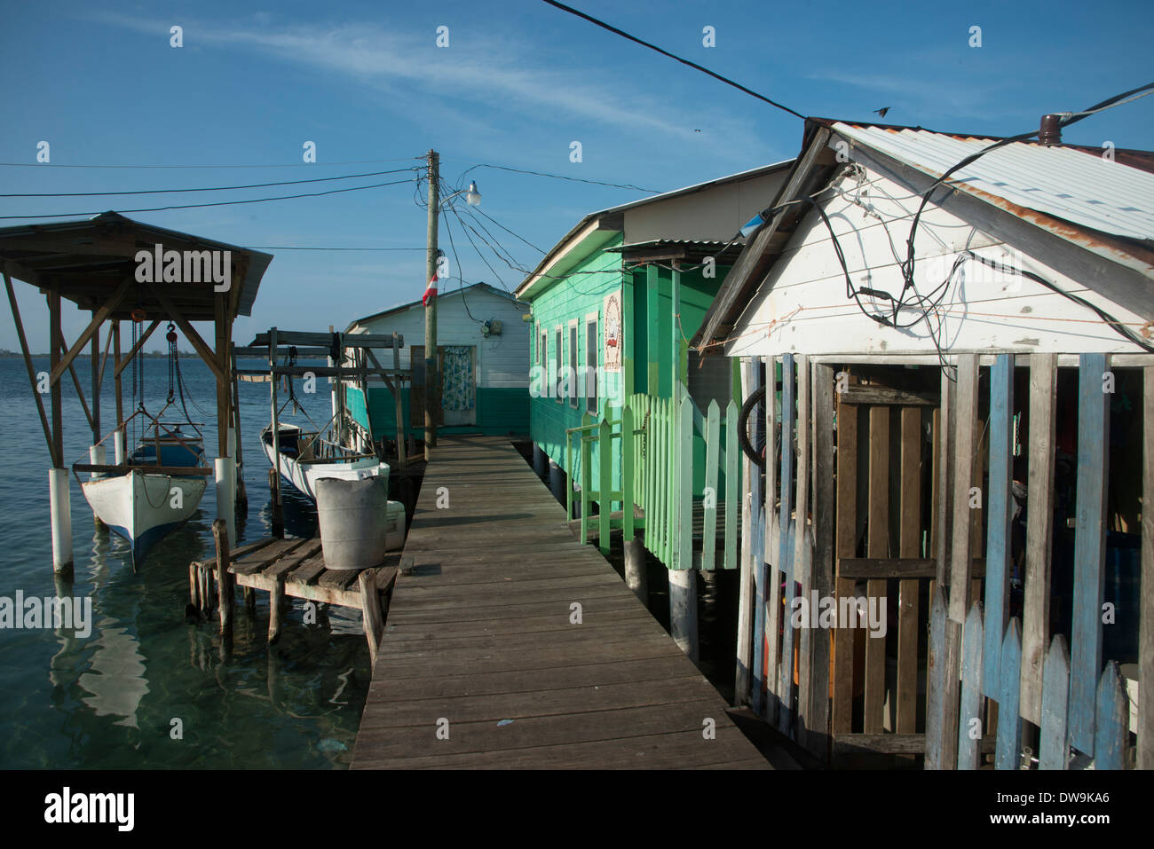Stilt houses at dock Cayman Cay Utila Island Bay Islands Honduras Stock