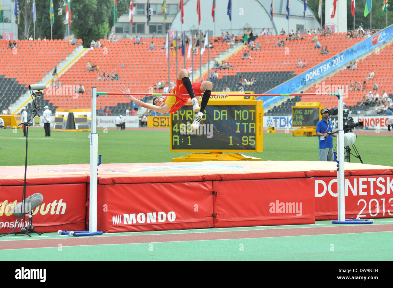 Athlete takes part in high jumping during the 2013 IAAF World Junior