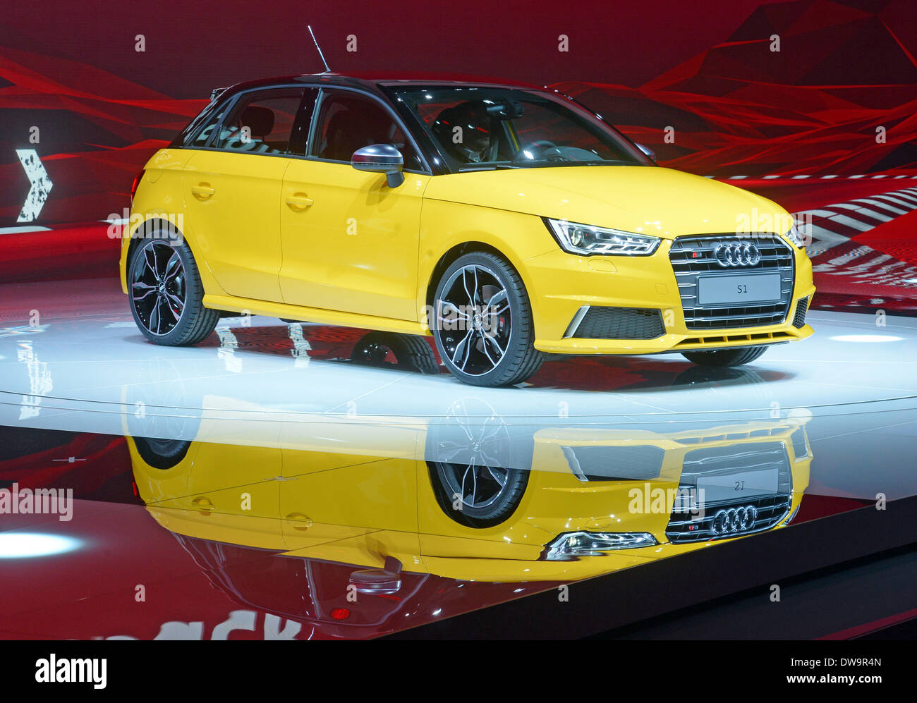 Geneva, Switzerland. 04th Mar, 2014. An Audi Audi S1 is presented at the Palexpo exhibition hall during the first press day of the Geneva Motor Show in Geneva, Switzerland, 04 March 2014. The 84th Geneva Motor Show 2014 takes place from 06 till 16 March 2014. Photo: Uli Deck/dpa/Alamy Live News Stock Photo