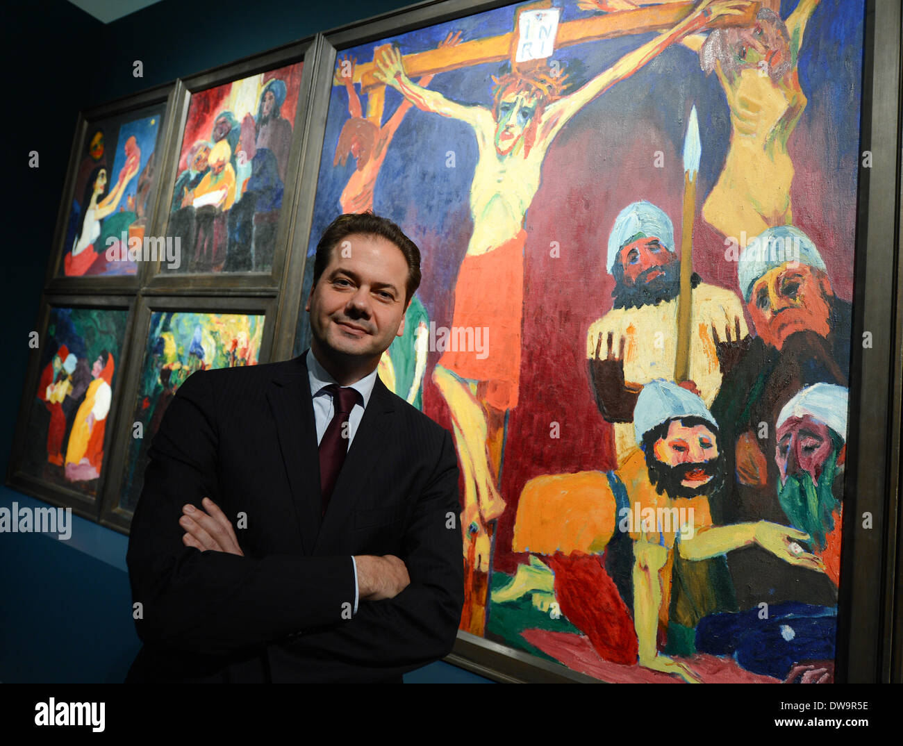 Staedel director Max Hollein stands in front of Emil Nolde's masterpiece 'The life of Christ (1911/12)' in the Staedel Museum in Frankfurt Main, Germany, 04 March 2014. In the exhibition running from 05 March to 15 June 2014 about 140 painting and printed graphics of famous German expressionist painter Emil Nolde are shown. Photo: Arne Dedert/dpa Stock Photo