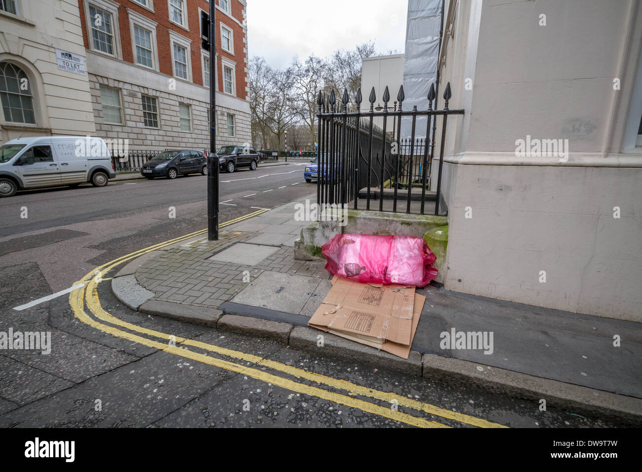 A rough sleeper's bedding seen during the day in West London, UK
