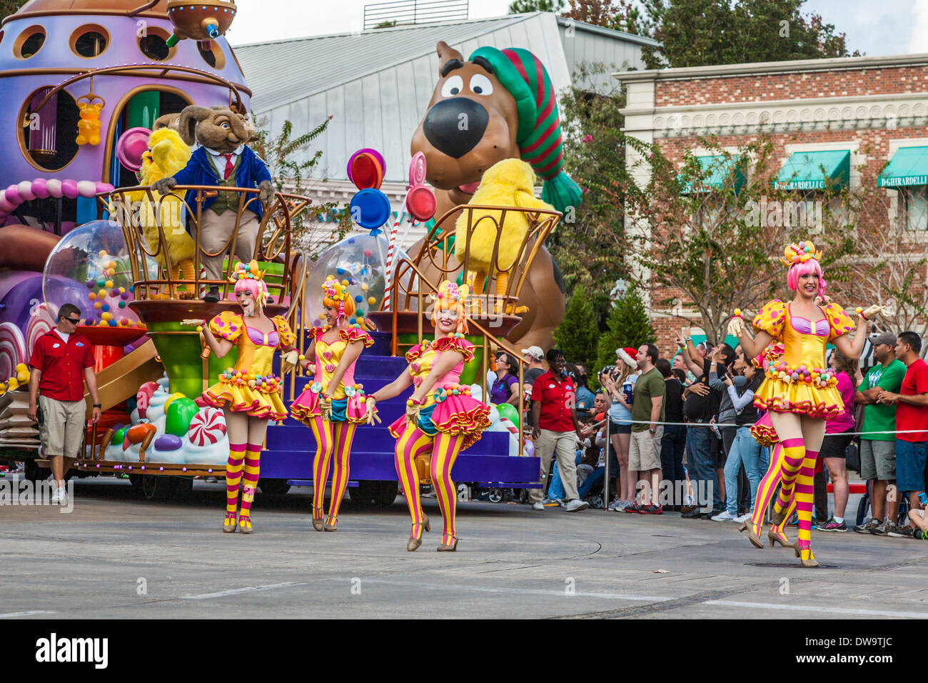 Dancing girls leading parade float at Universal Studios theme park in