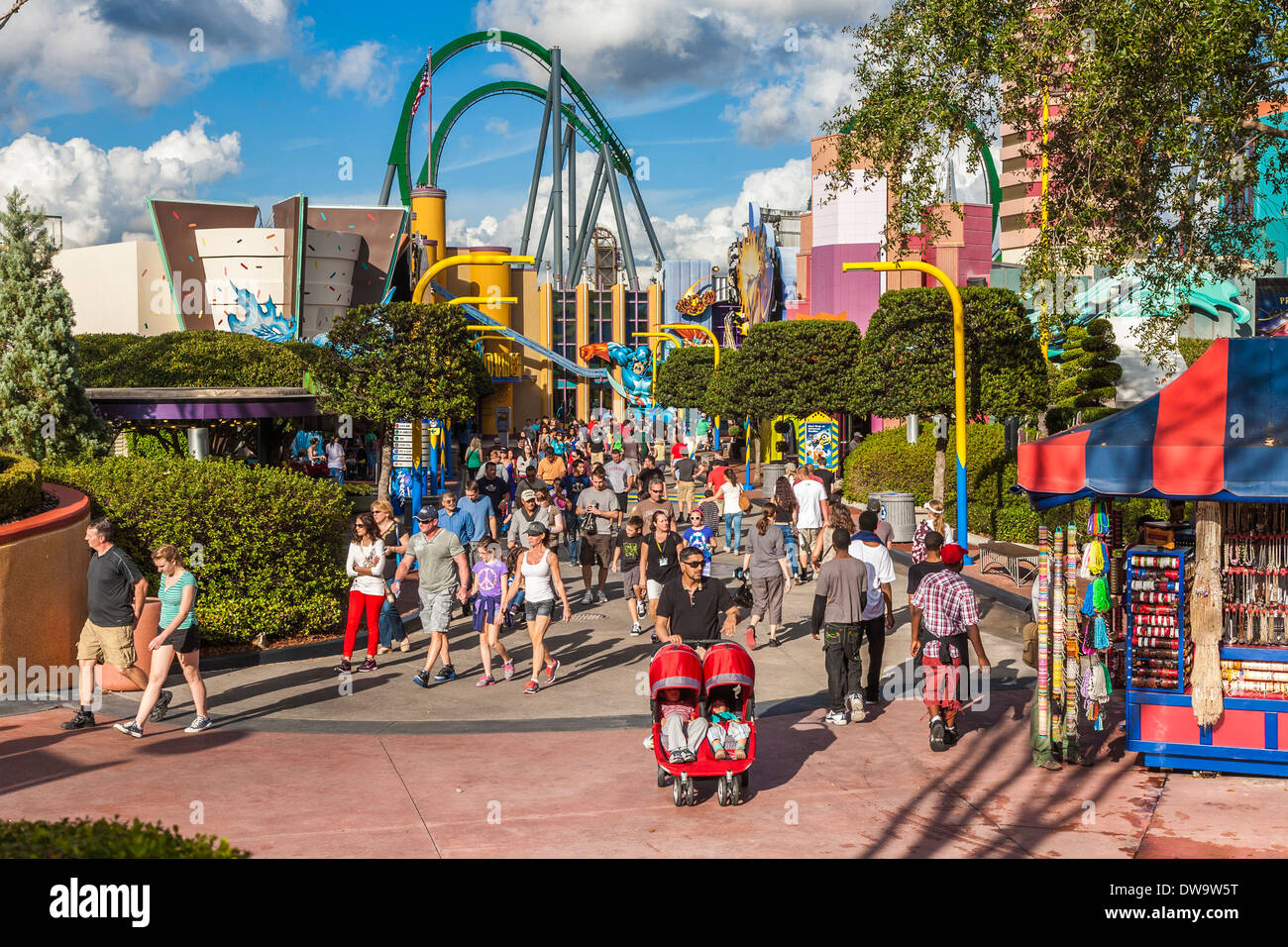 Father pushes dual baby stroller through Super Hero Island at Universal