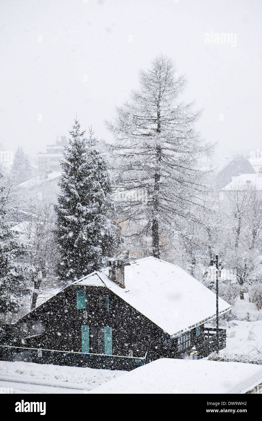 Snowing in Alpine village of Chamonix-Mont-Blanc, Haute Savoie, Rhone-Alpes, France, Europe Stock Photo