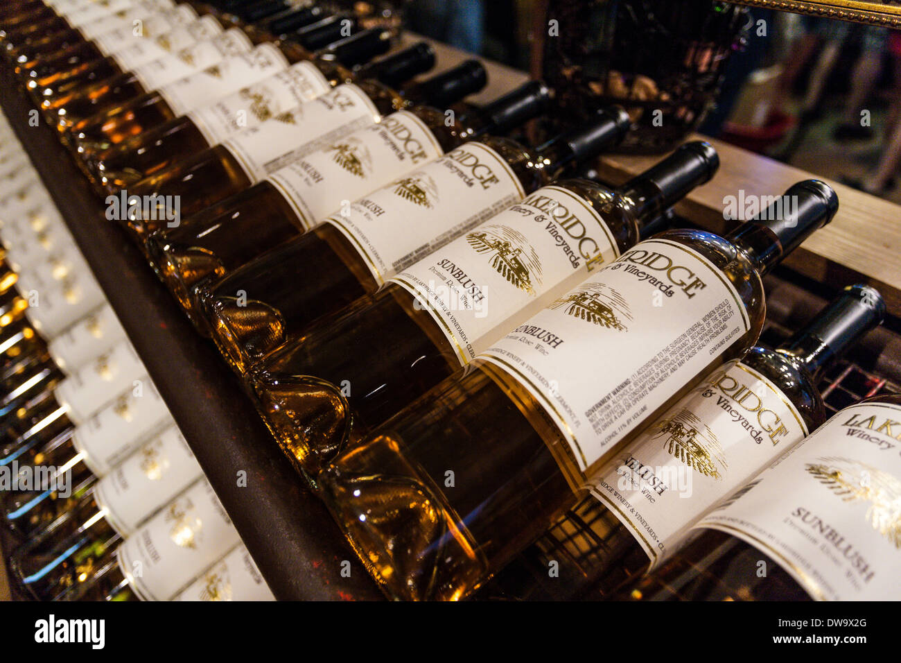 Bottles of Sunblush white wine on shelves at the Lakeridge Winery and Vineyard in Clermont, Florida Stock Photo