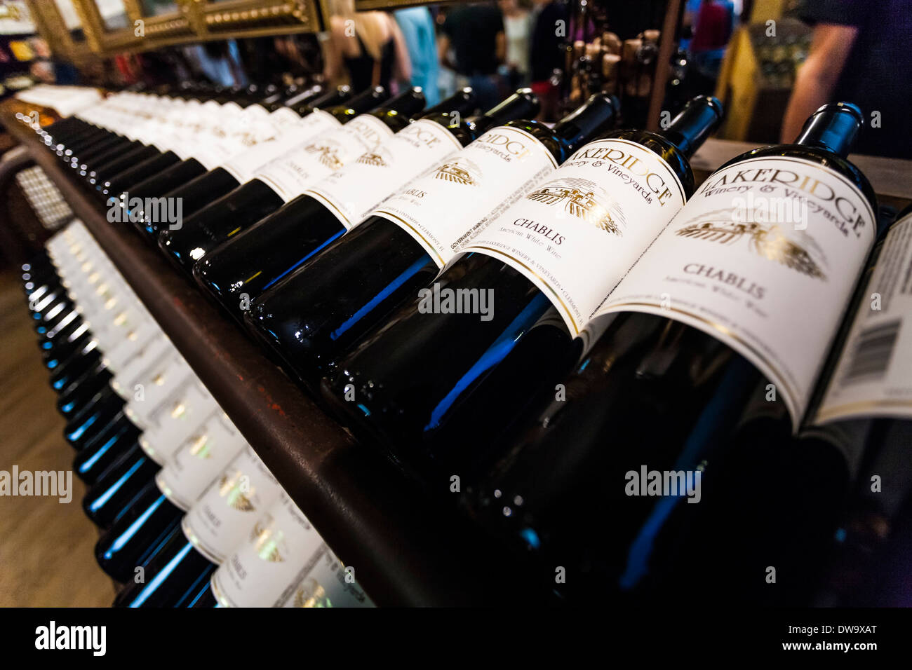 Bottles of Chablis white wine on shelves at the Lakeridge Winery and