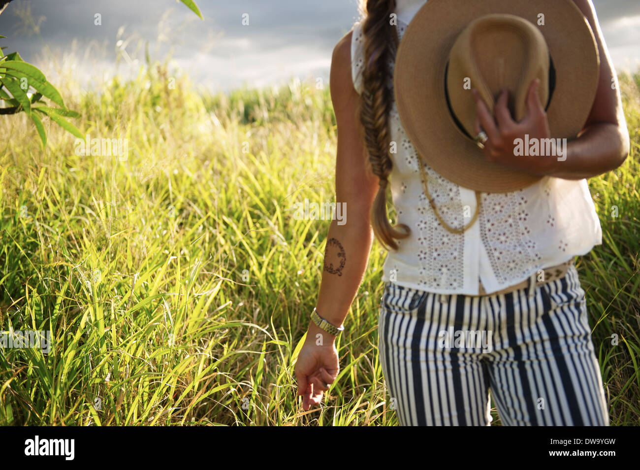 Young woman in countryside Stock Photo