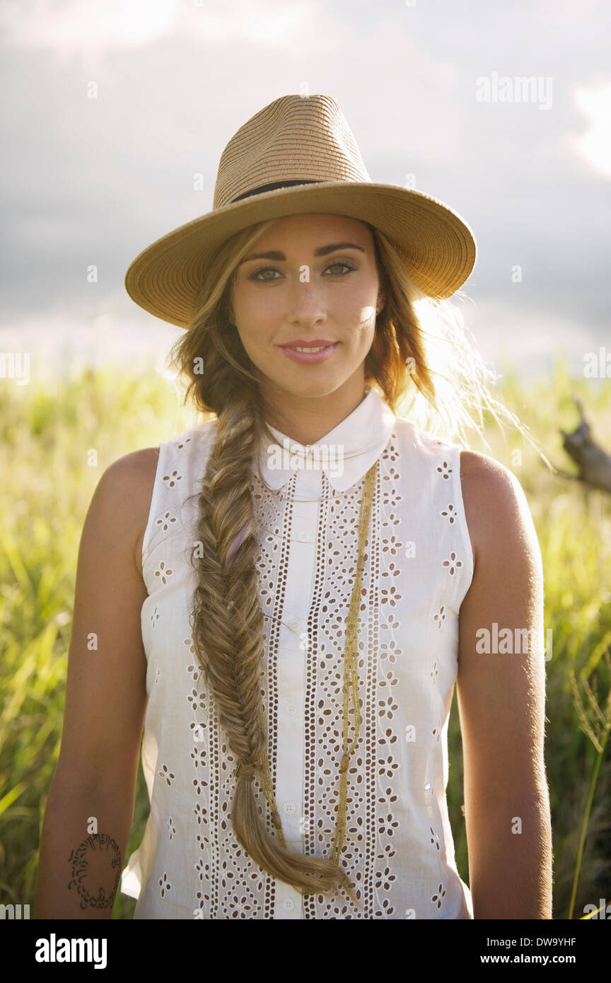 Portrait of young woman in countryside Stock Photo