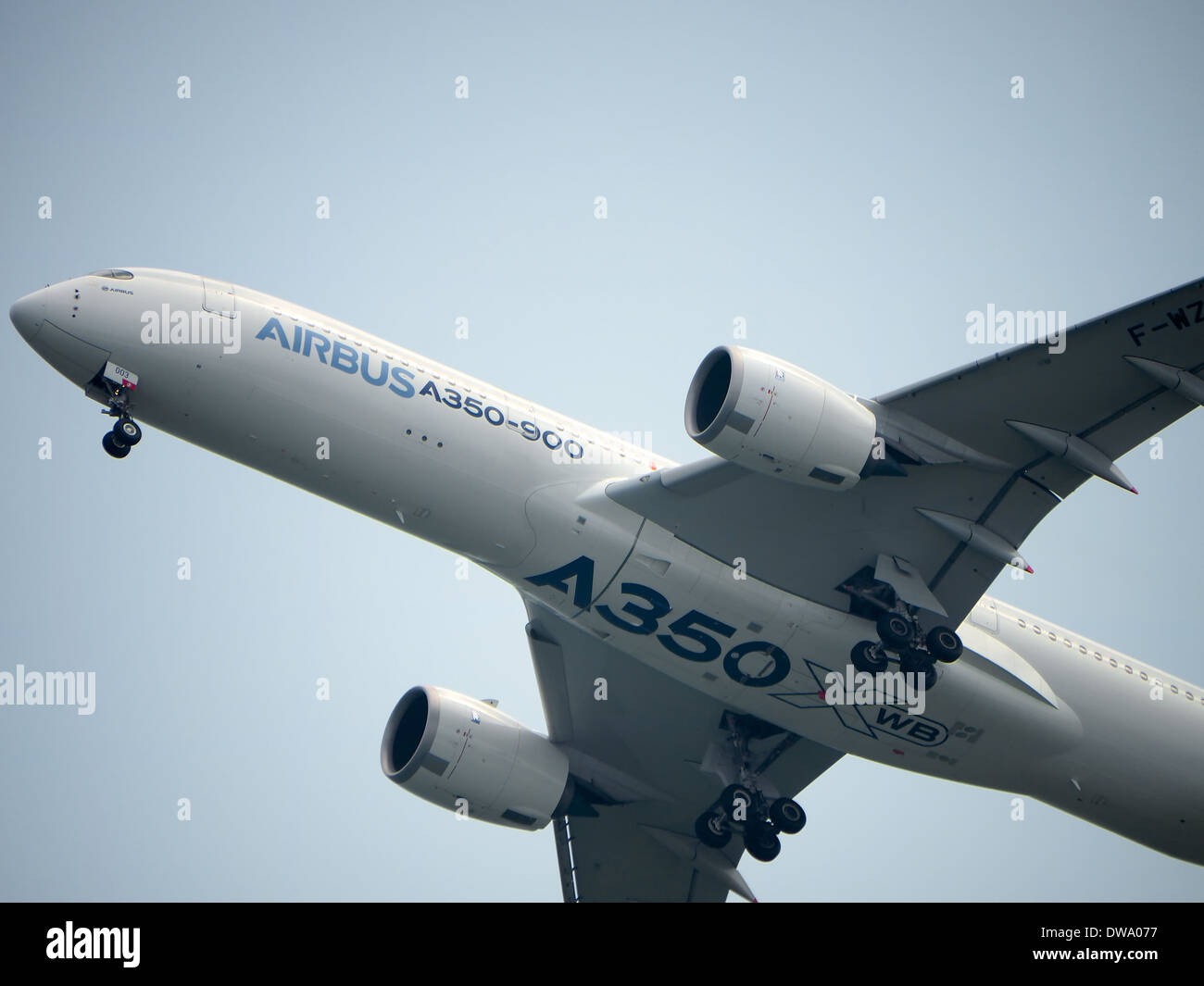 The Airbus A350 XWB doing a aerial demonstration at the 2014 Singapore Airshow, Changi Exhibition Centre Stock Photo