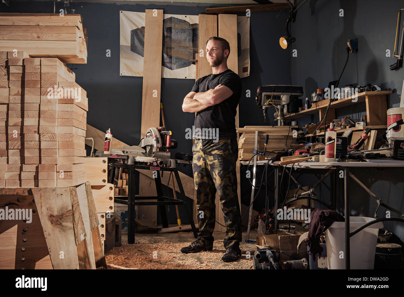 Portrait of mid adult man in carpenter workshop Stock Photo