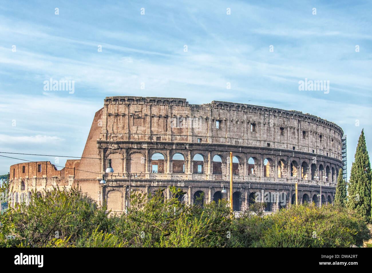 The ancient ruin of the Roman Colosseum amphitheater situated in the Italien capital of Rome. Stock Photo
