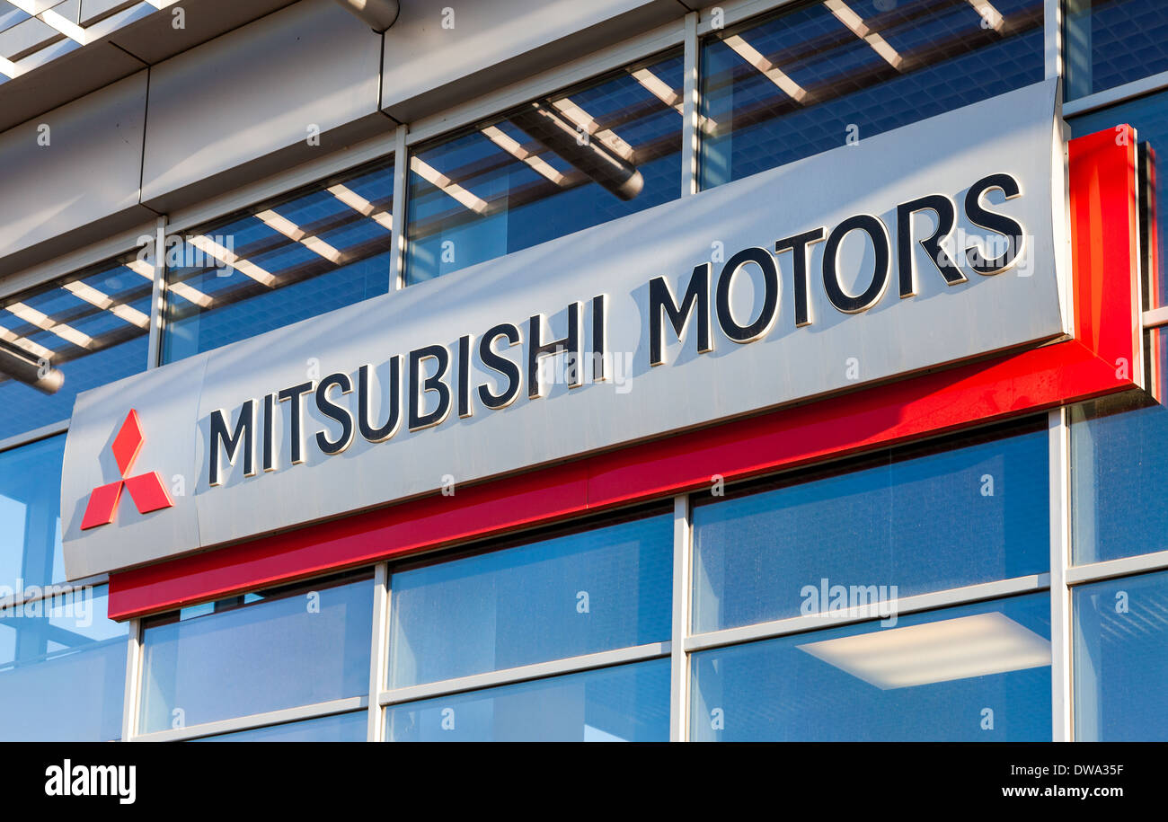 The emblem Mitsubishi on the office of official dealer. Stock Photo