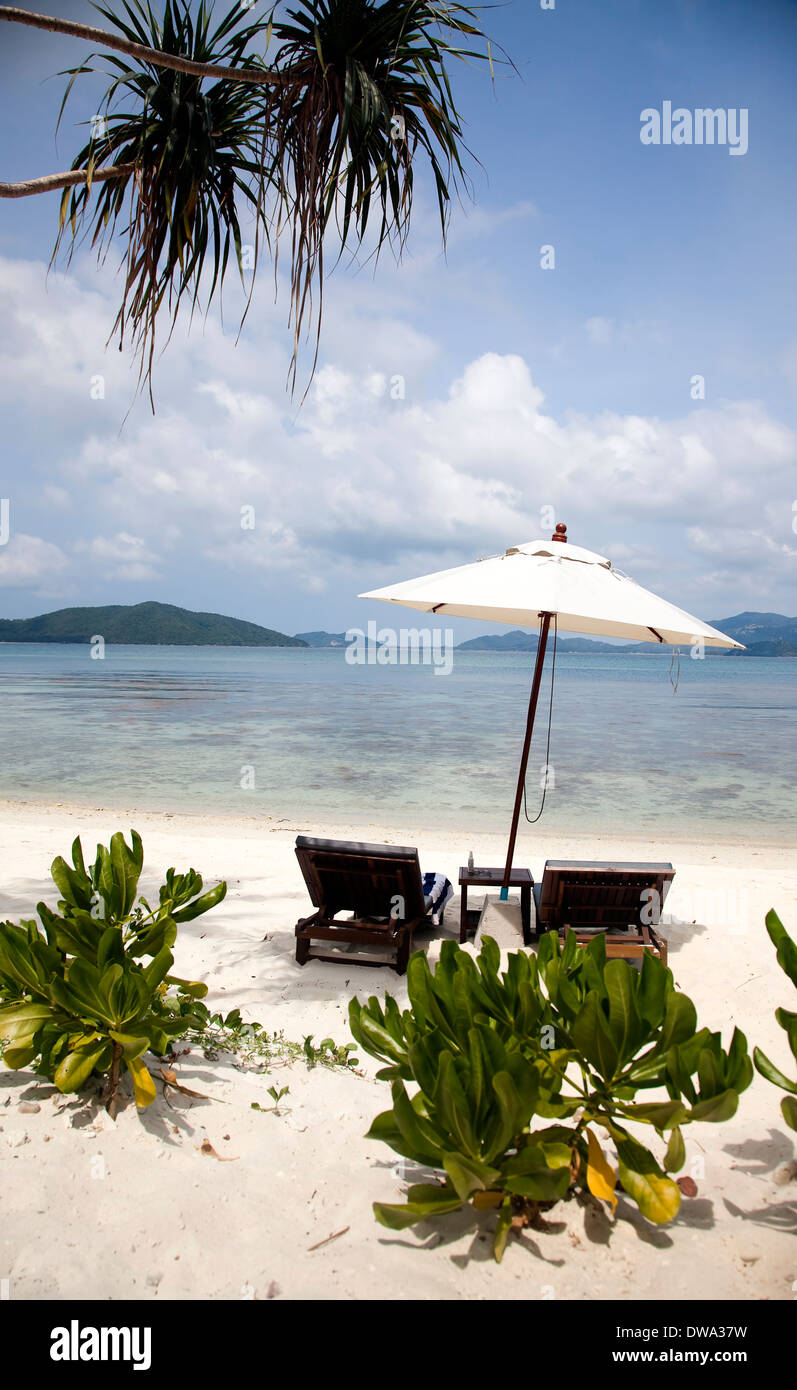 Beach chairs on exotic beach Stock Photo