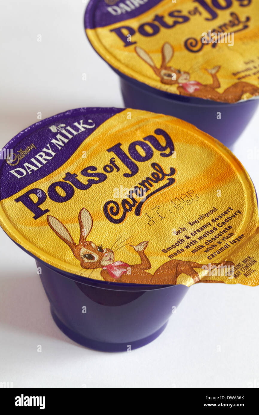 Cadbury Dairy Milk Pots of Joy Caramel set on white background Stock