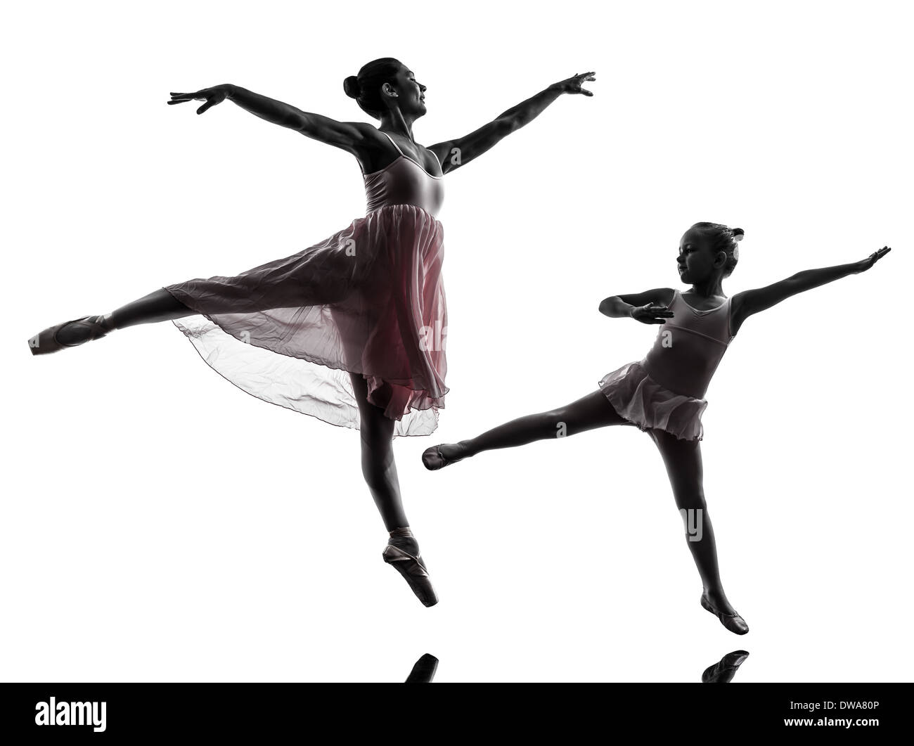 woman and little girl ballerina ballet dancer dancing in silhouette on
