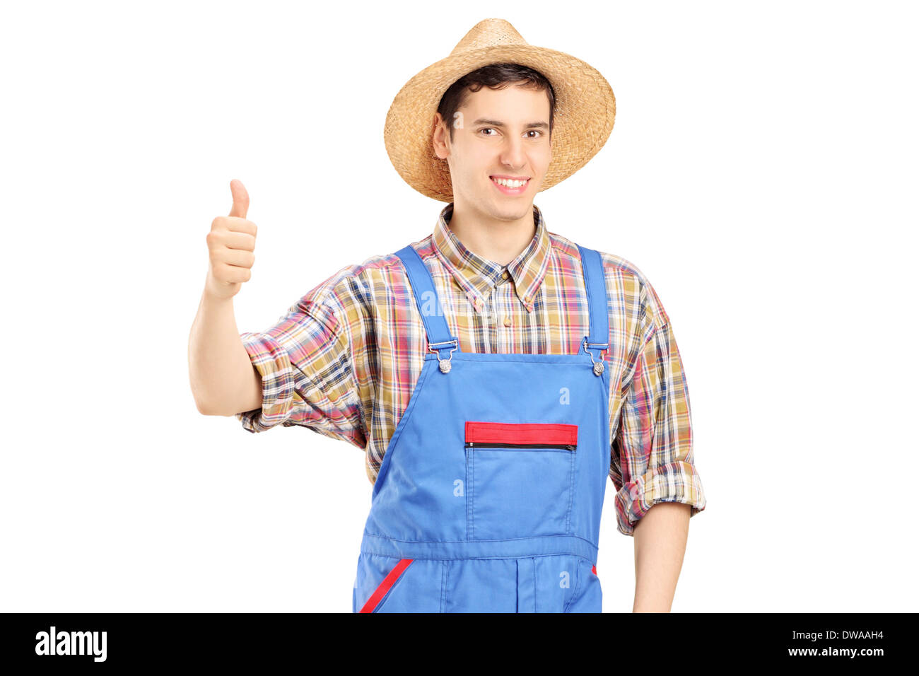 Young smiling farmer giving a thumb up Stock Photo - Alamy