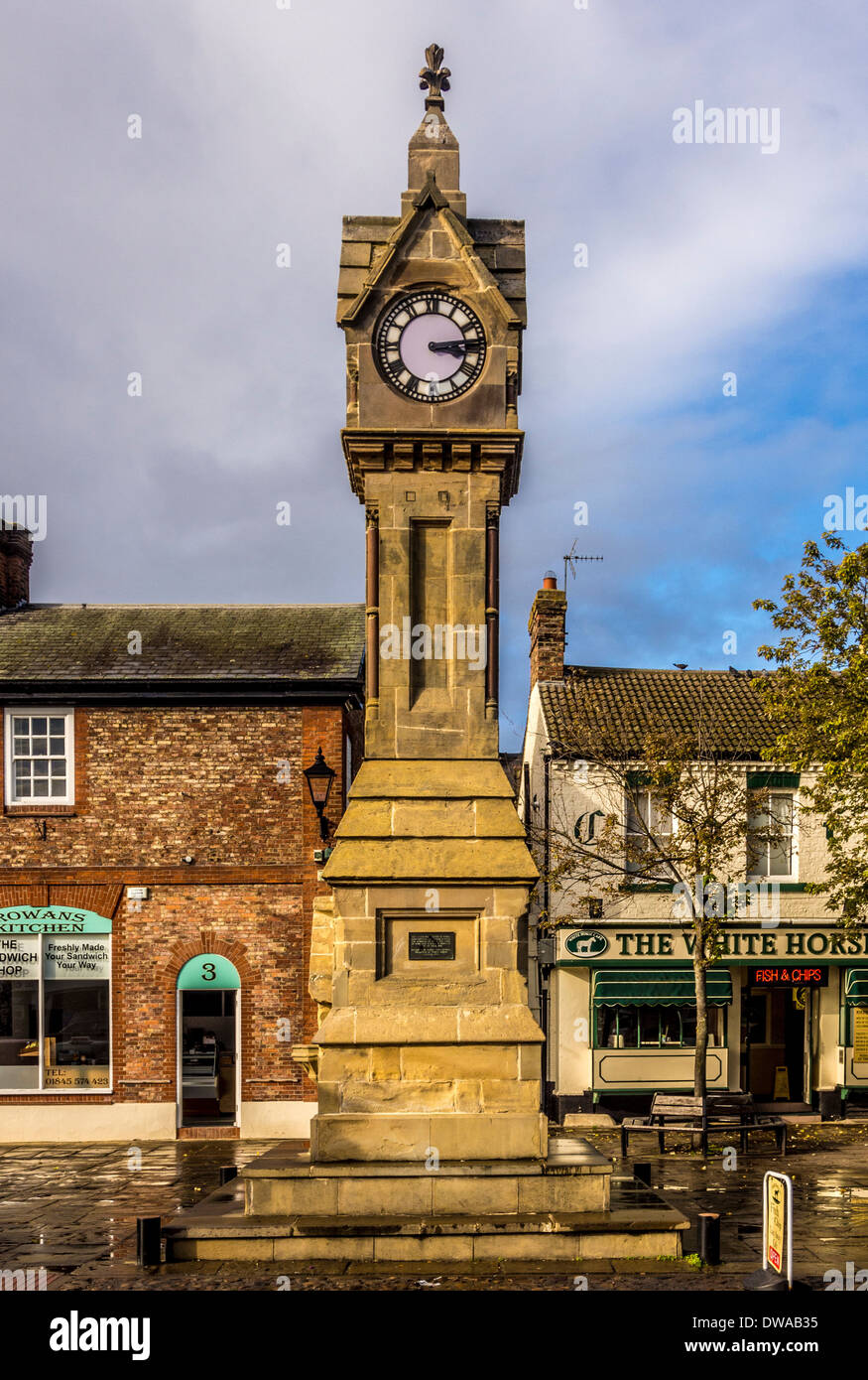 Clock monument in town square, Thirsk, North Yorkshire, UK. Stock Photo