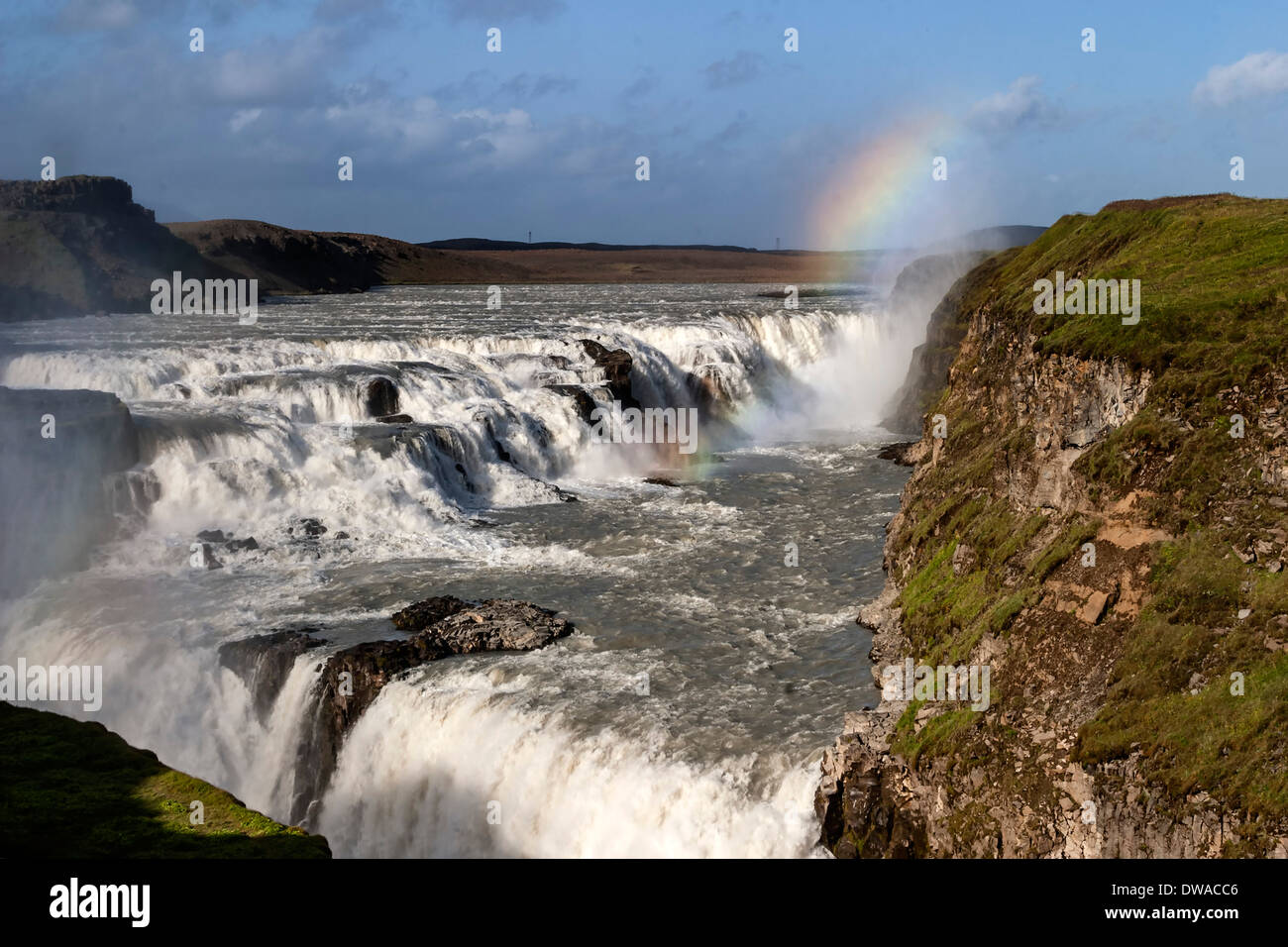 Iceland Gulfoss waterfall sunset rainbow Stock Photo