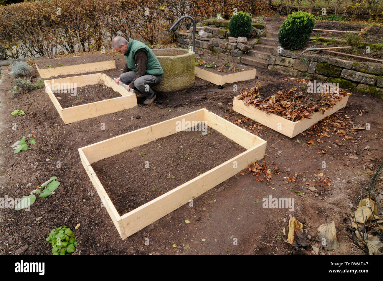 Installation of organic garden, boxes system, compost Stock Photo Alamy