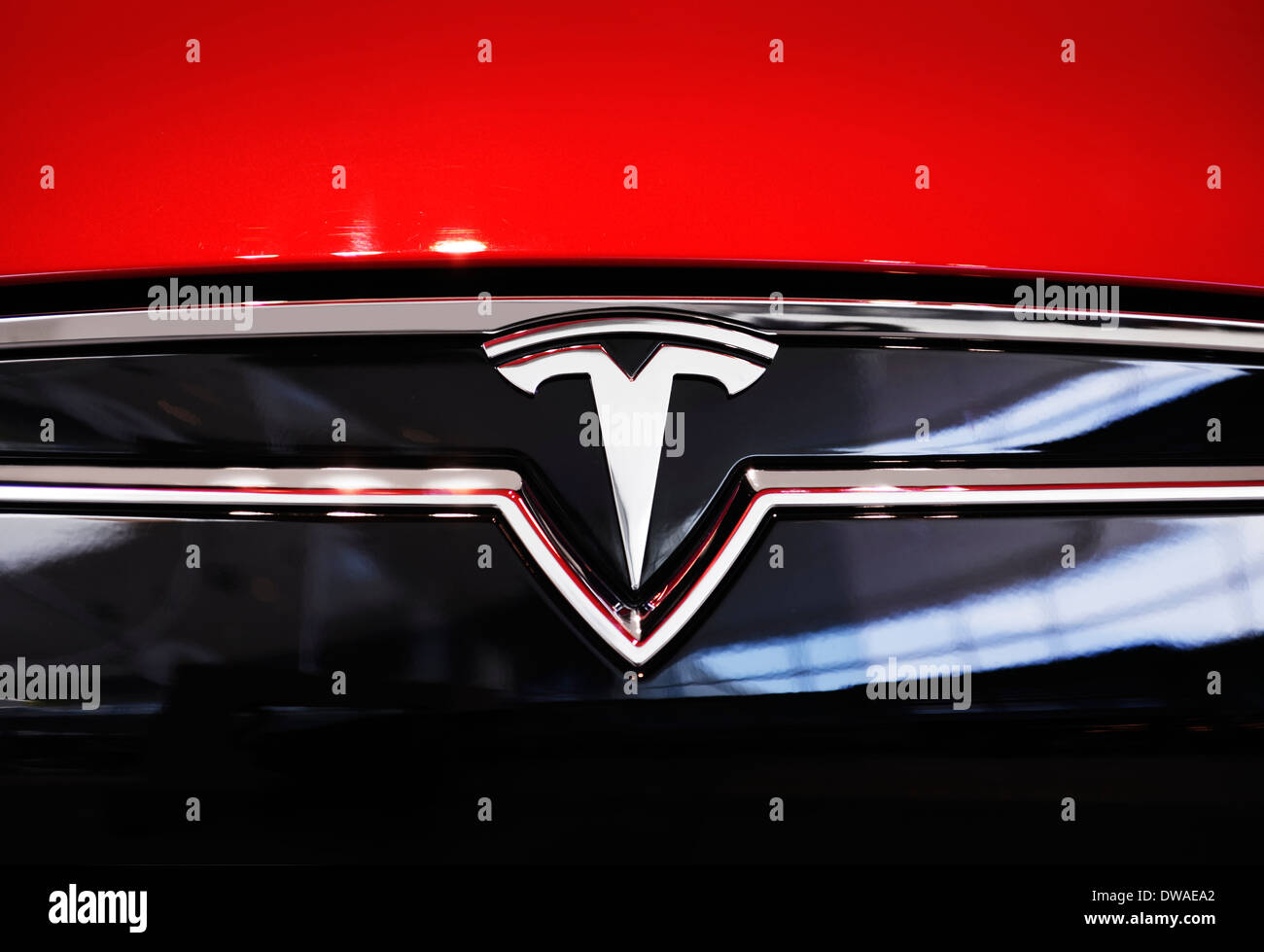 Tesla Motors emblem, Tesla model S car logo closeup Stock Photo