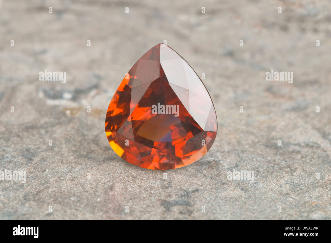 Australian Orange Sapphire on marble Stock Photo