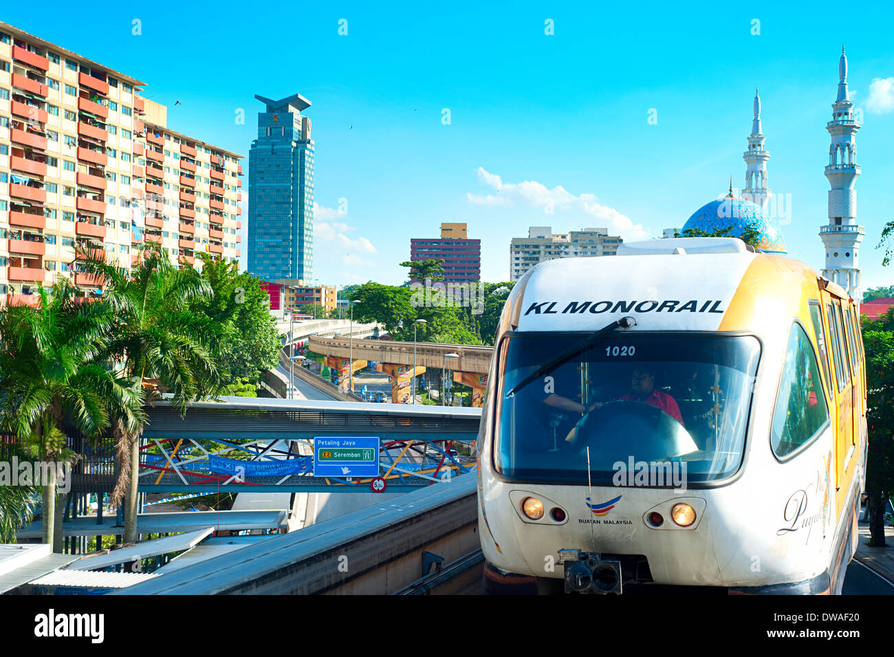 Monorail train arrives at a train station in Kuala Lumpur Stock Photo