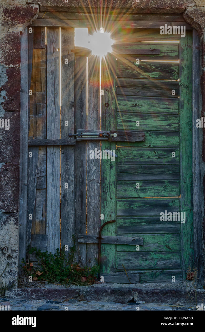 Old Wooden Door at an Abandoned Building Stock Photo