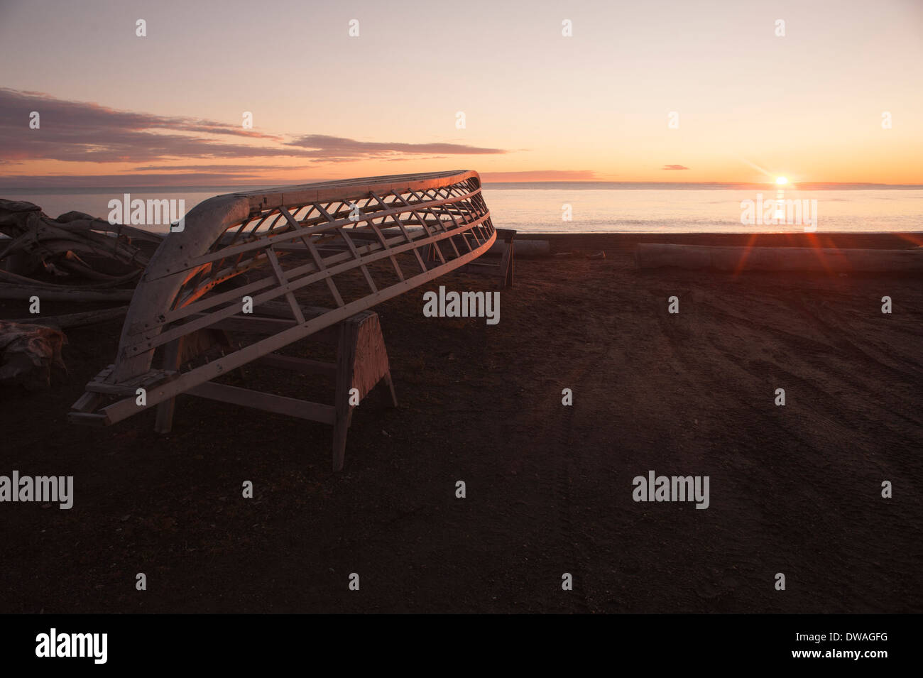 Horizontal photo of Whaling boat made of driftwood on the edge of the Chukchi Sea, Barrow, Alaska Stock Photo