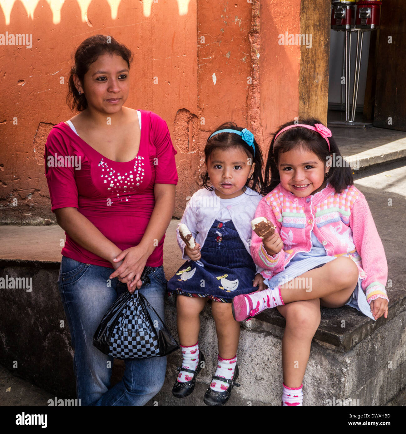 Guatemalan mother with her two daughters in Antigua, Guatemala Stock Photo Alamy