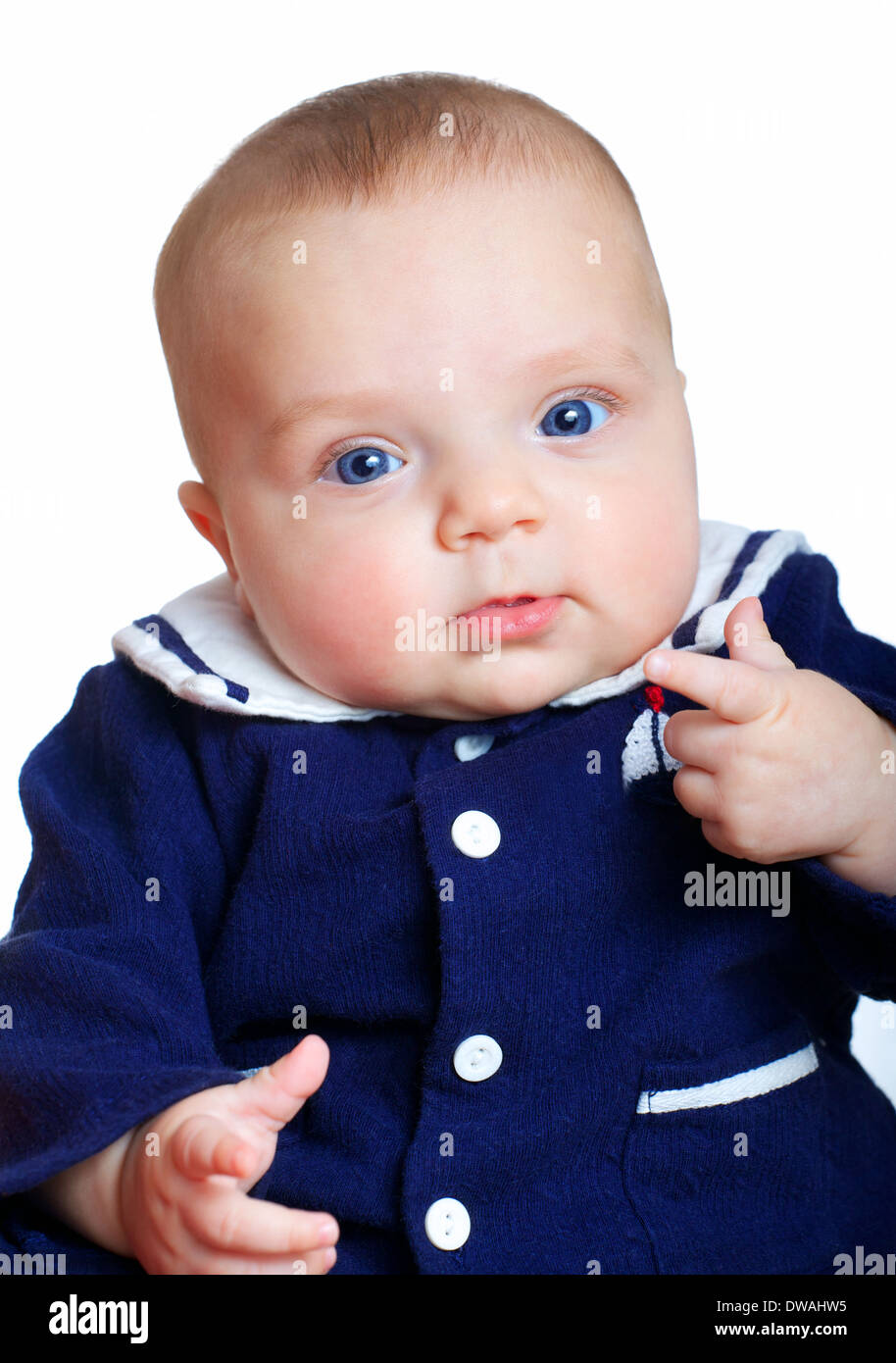 Baby girl wearing a blue sailor suit Stock Photo