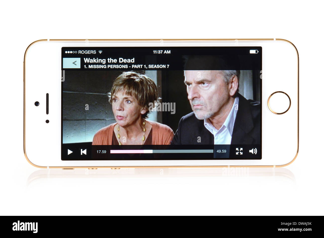 BBC iPlayer streaming movie on iPhone 5S, Apple free App for iPhone 5 S used to stream TV Show Waking the Dead Stock Photo