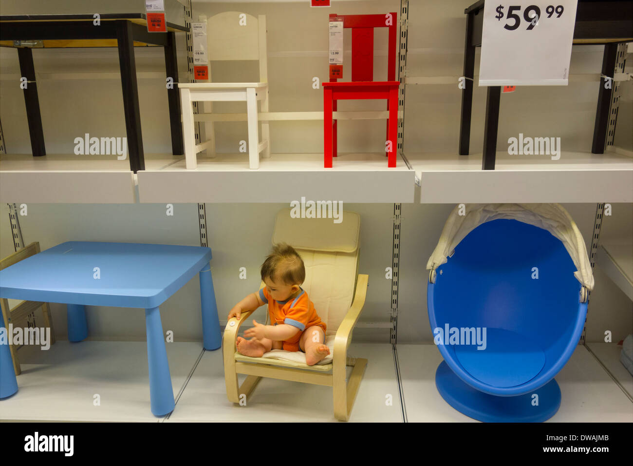 toddler in chair Stock Photo