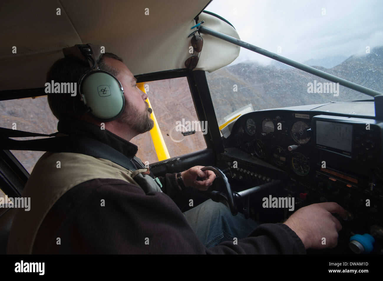 Single engine airplane pilot flying in bad weather Stock Photo