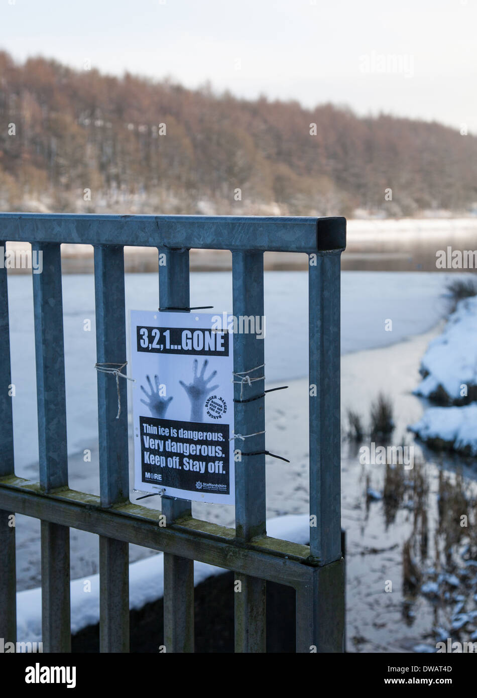 A warning sign saying don't go on the ice issued by Staffordshire Fire and Rescue Service at Bathpool Kidsgrove Stoke-on-Trent Stock Photo