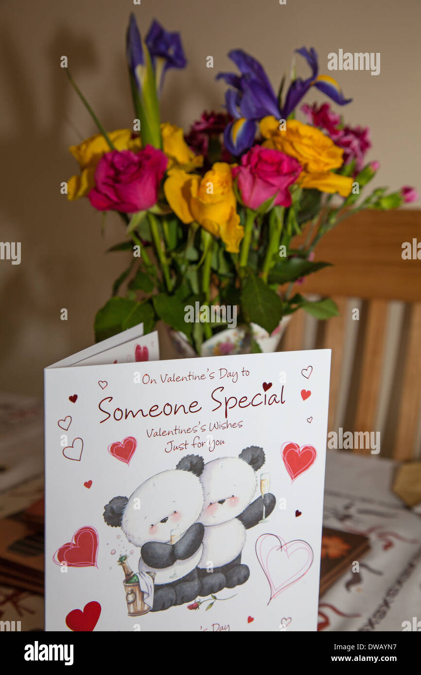 A Valentines day card and flowers Stock Photo Alamy