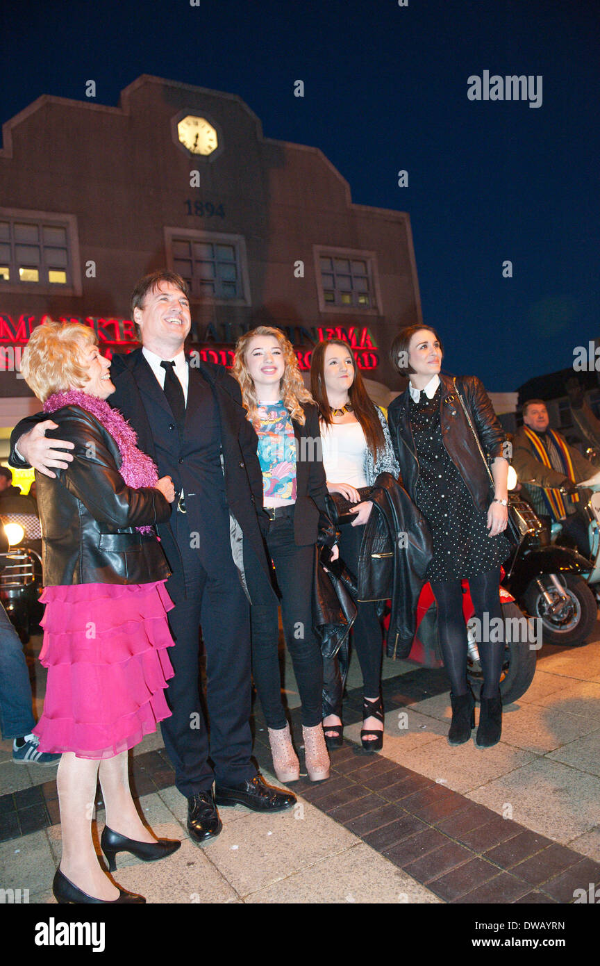 Brynmawr, Baenau Gwent, Wales, UK. 4th March 2014. Jonny Owen & family & Vicky McClure outside the Market Hall cinema. Merthyr Tydfil’s very own Jonny Owen premieres his latest film SVENGALI, co-starring Vicky McClure, which was shot on location in the Welsh mining valleys. The premiere is held at the oldest independent cinema in Wales – The Market Hall Cinema in Brynmawr. Credit:  Graham M. Lawrence/Alamy Live News. Stock Photo