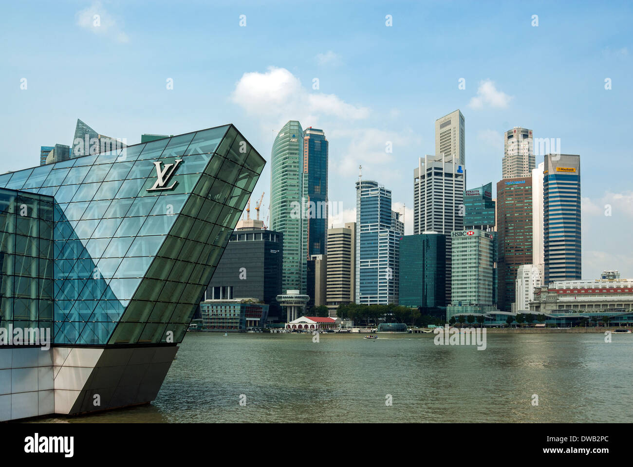 The Louis Vuitton store with modern glass and steel construction at Marina  Bay Sands set in the water of the bay in Singapore Stock Photo - Alamy