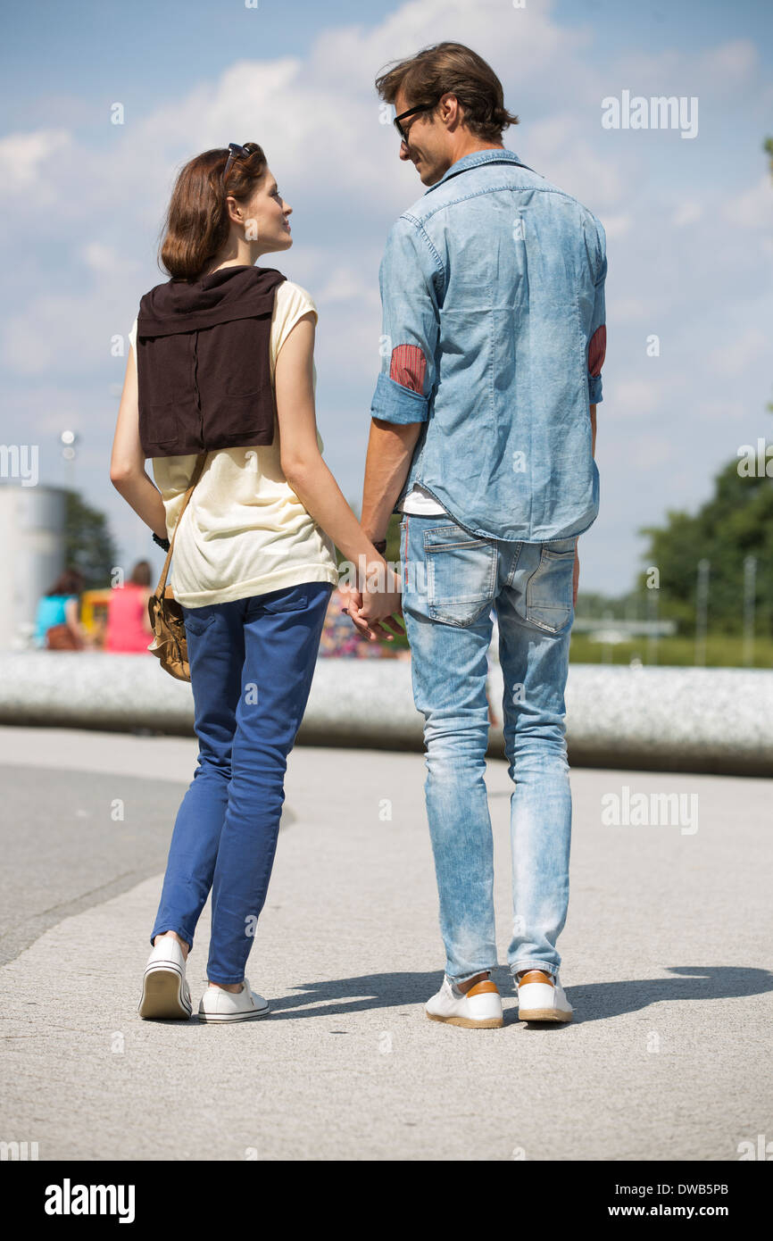 Couple holding each other hands hi-res stock photography and images - Alamy
