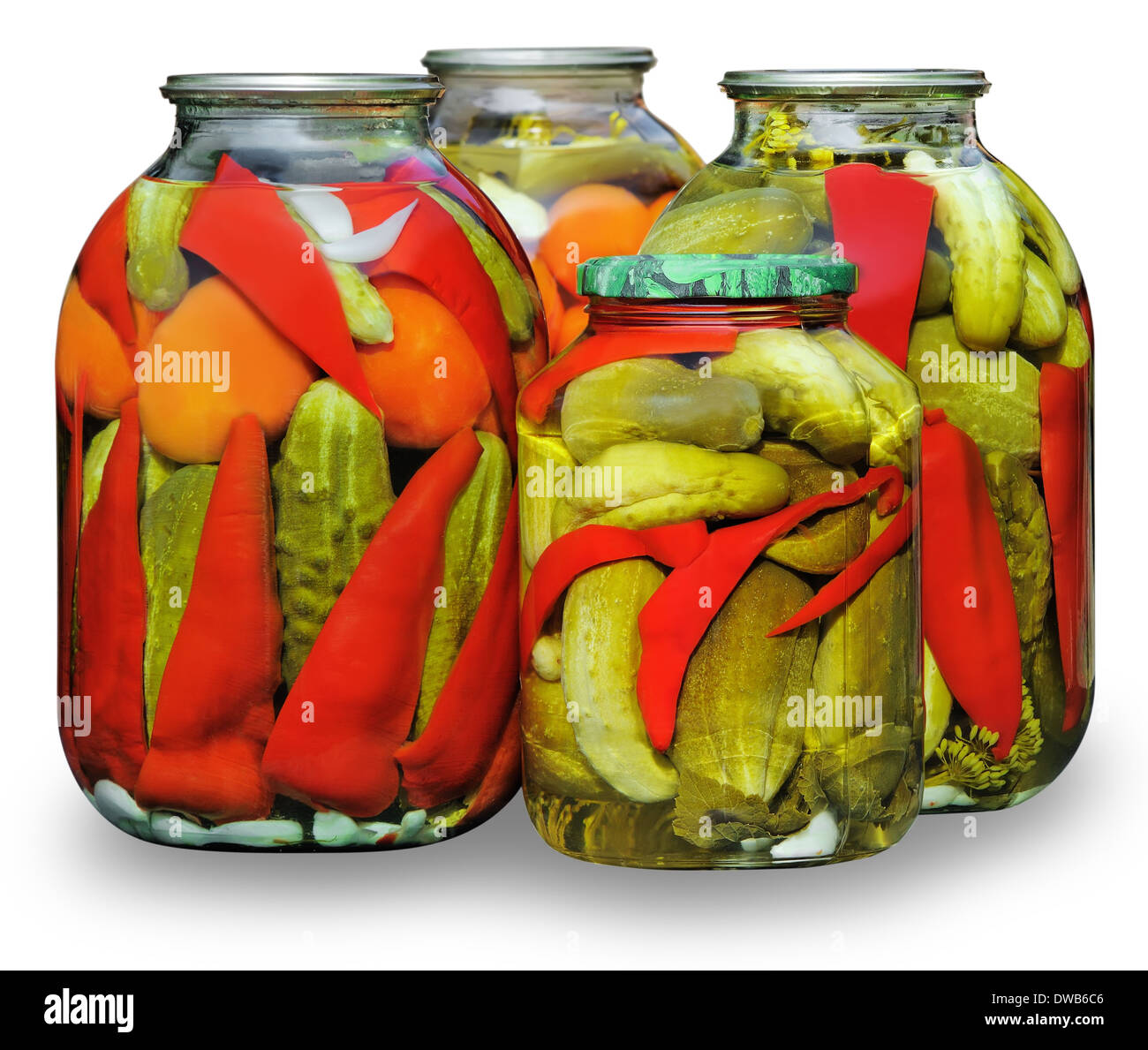 Homemade pickled vegetables. Assorted in glass jars Stock Photo