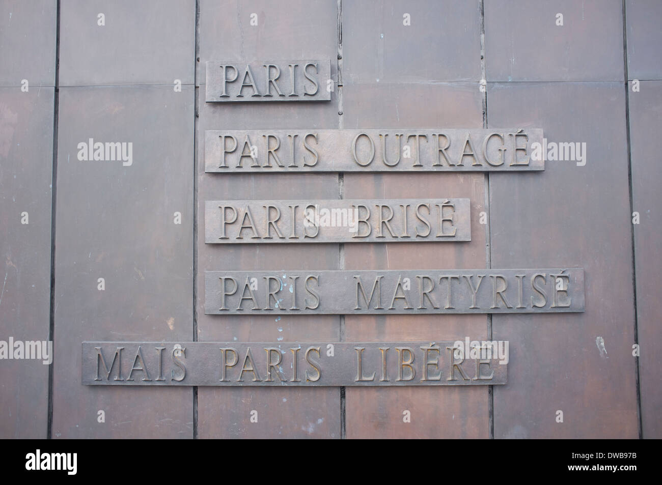 The inscription on one side of General de Gaulle's statue in Paris Stock Photo