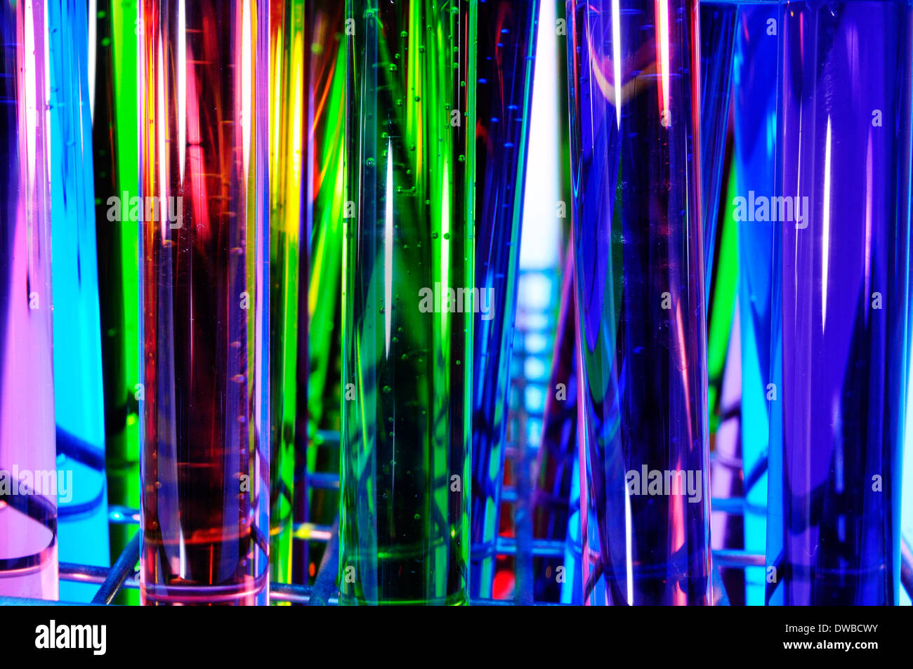 closeup of a pile of test tubes with liquids of different colors Stock Photo
