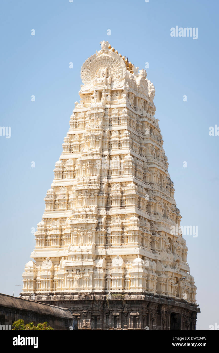 India Tamil Nadu Kanchipuram Sri Ekambaranathar Ekambareswarar Temple Temples Shiva Hindu 6th century Gopuram tower towers blue sky carvings statues Stock Photo