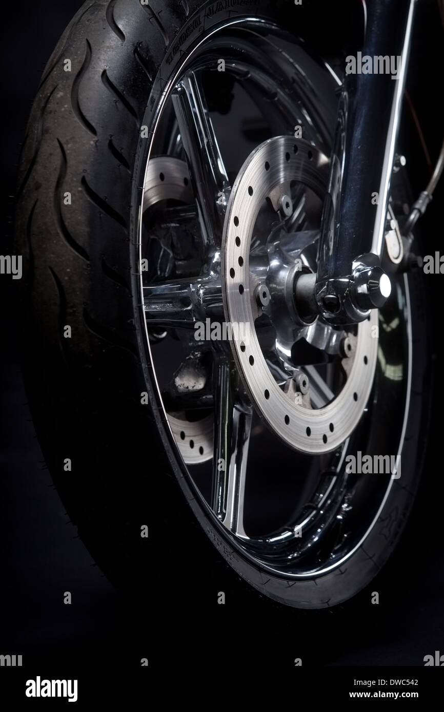 Color shot of a motorcycle forks and tire Stock Photo - Alamy