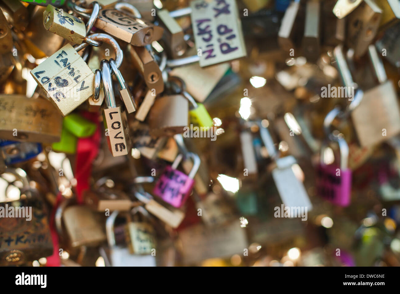 Detail of padlocks on the The Pont des Arts or Passerelle des Arts, focused on one that reads 'love'. Stock Photo