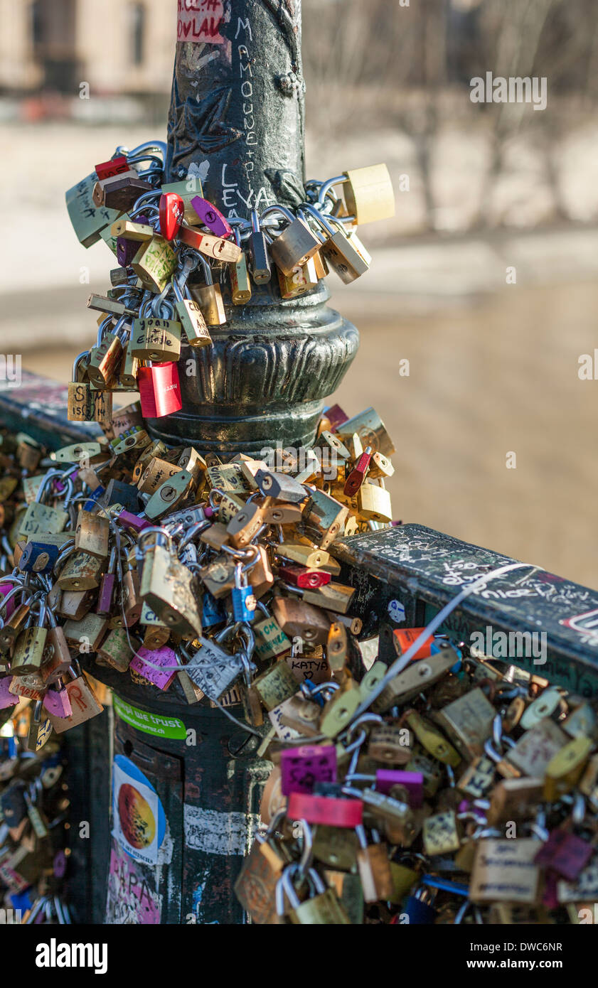 Detail of padlocks on the The Pont des Arts or Passerelle des Arts, focused on a lamppost. Stock Photo