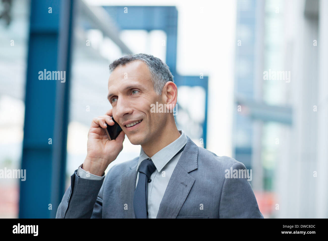 Businessman talking on smartphone Stock Photo