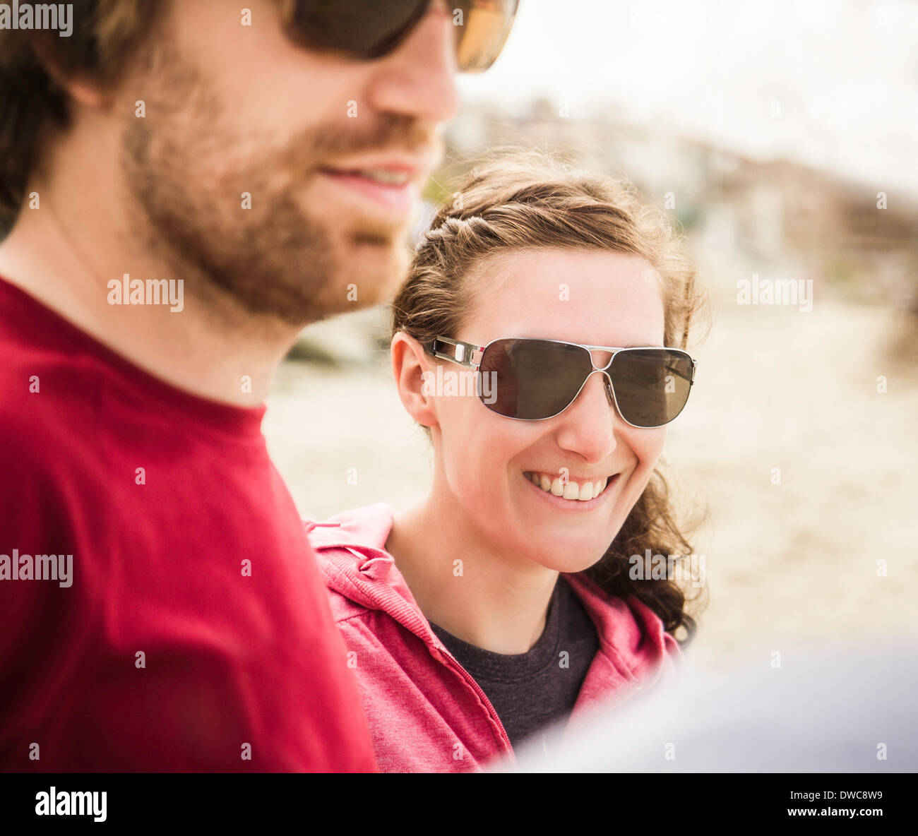 Close up of young couple at beach Stock Photo